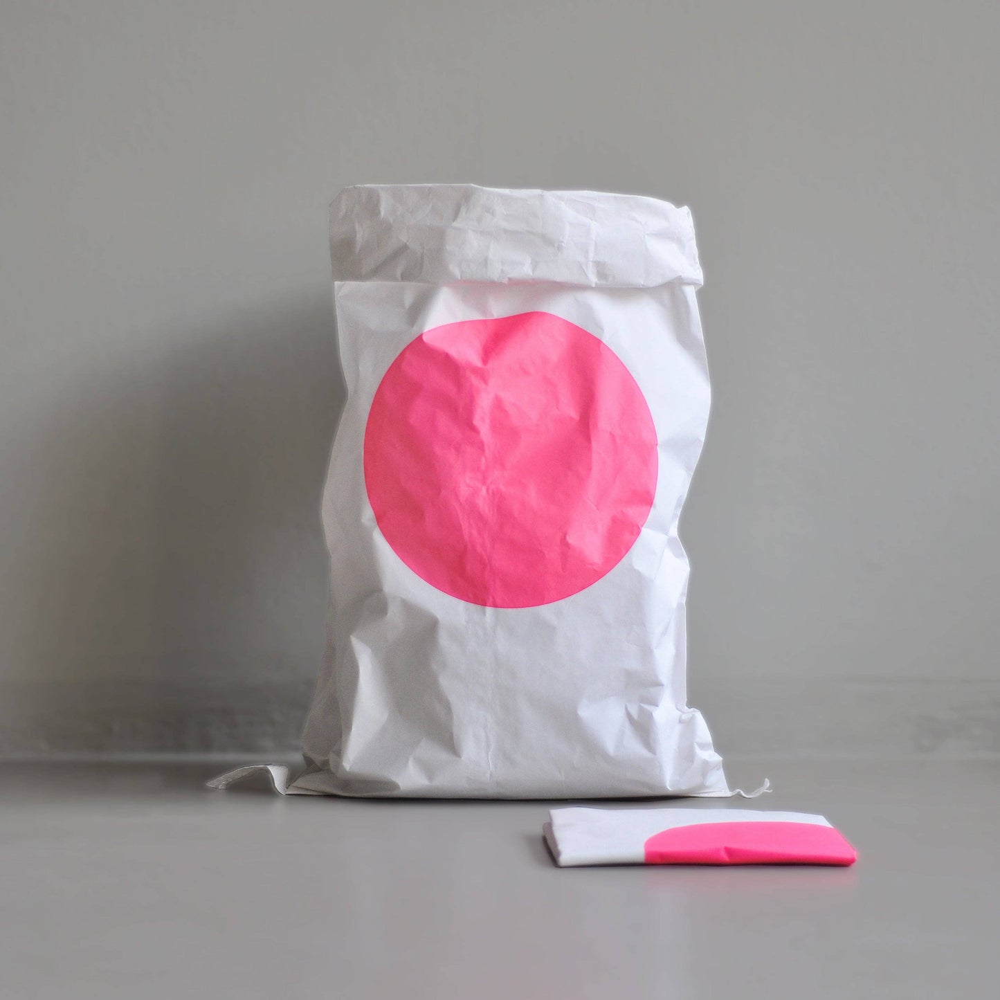 Papiertüte Kreis / Papiertüte Neon PINKER PUNKT